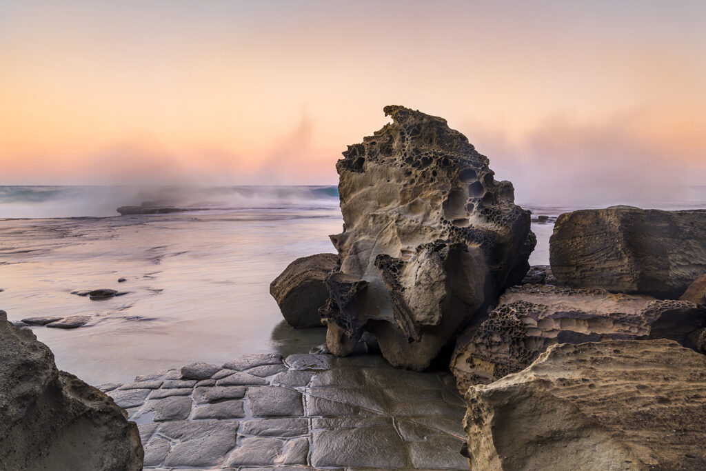 A photographic journey to the Figure Eight Pools in Royal National Park, capturing the raw beauty, danger, and changing moods of this iconic Australian coastal landscape.