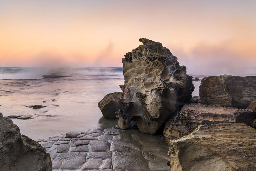 A photographic journey to the Figure Eight Pools in Royal National Park, capturing the raw beauty, danger, and changing moods of this iconic Australian coastal landscape.