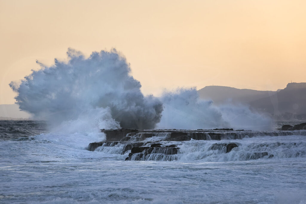 A photographic journey to the Figure Eight Pools in Royal National Park, capturing the raw beauty, danger, and changing moods of this iconic Australian coastal landscape.