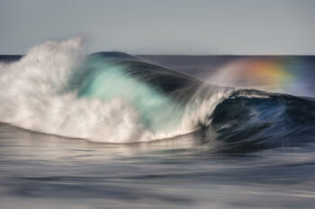 Turquoise ocean wave with sea spray on the South Coast of New South Wales, Australia, in fine art seascape photography
