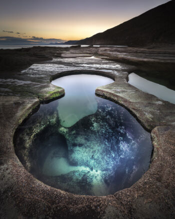 Figure Eight Pools at sunset in Royal National Park, Sydney, Australia, captured as fine art coastal landscape photography.