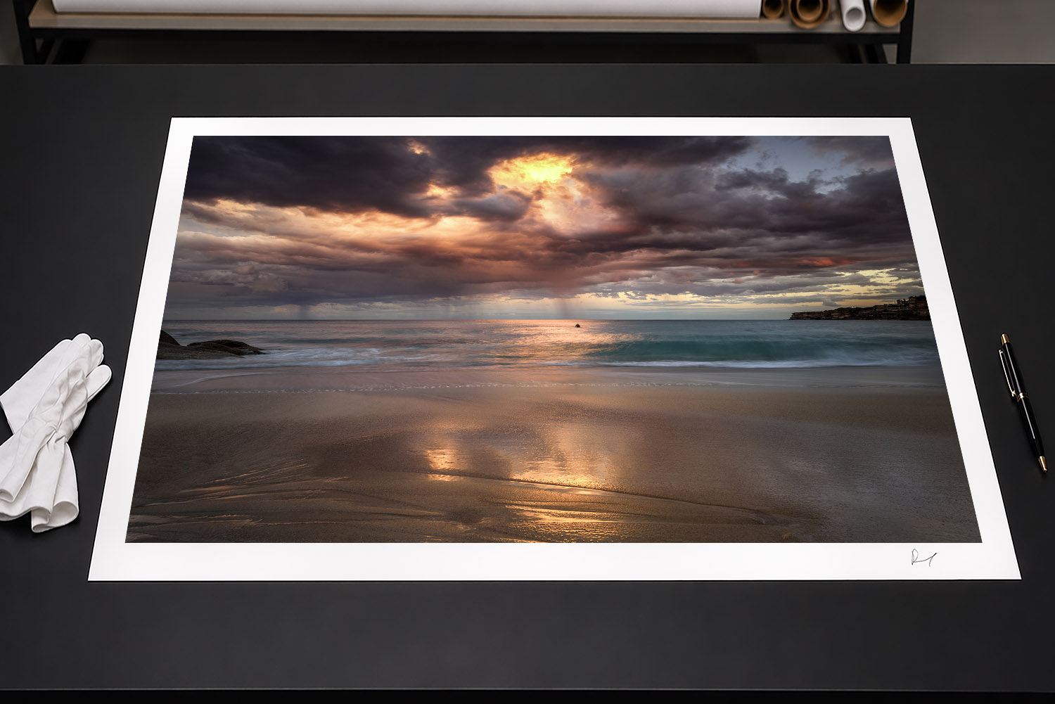 Fine art print of a dramatic sunset and storm clouds over Tamarama Beach, Sydney, Australia.