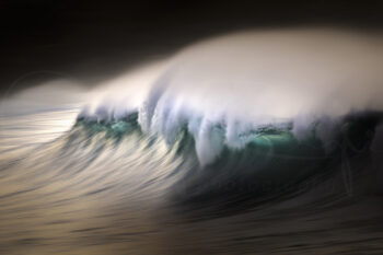 Turquoise breaking wave with sea spray at sunrise at Bronte Beach, Sydney, in fine art seascape photography