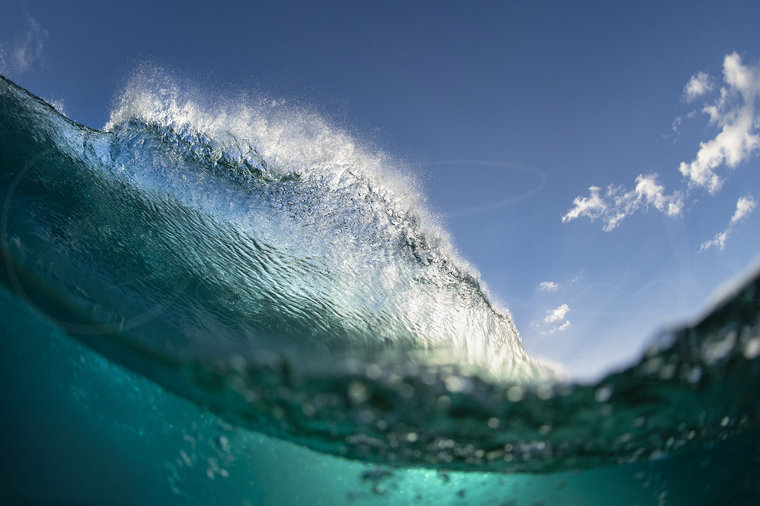 Turquoise ocean wave breaking under a blue sky at Snapper Rocks, Gold Coast, Australia, fine art ocean photography