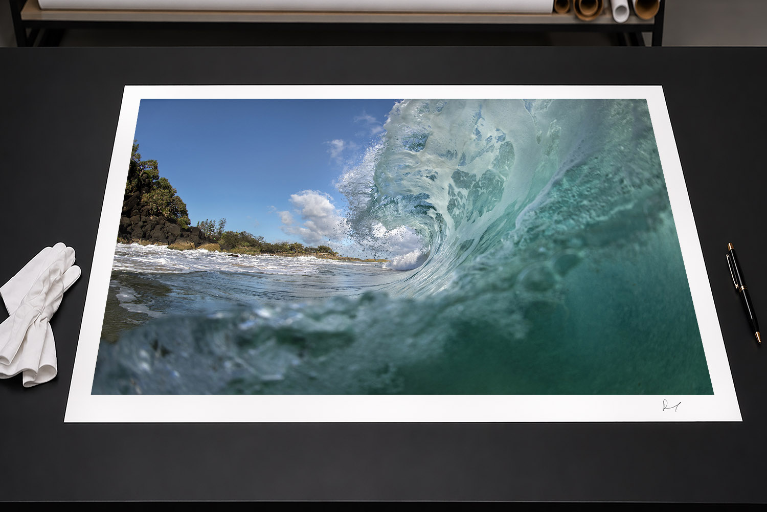 Fine art photographic print of a turquoise barrel wave breaking beside the rocky shoreline at Snapper Rocks, Gold Coast