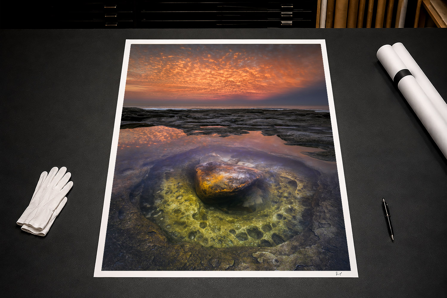 Fine art print of a fiery sunset reflected in a coastal rock pool at Tamarama Beach, Sydney, Australia.