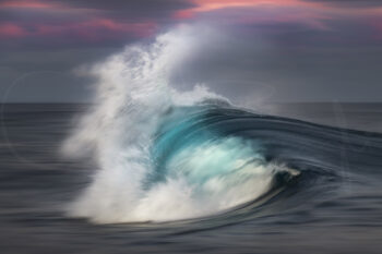 Turquoise breaking ocean wave beneath a pink sunset sky on the South Coast of New South Wales, fine art seascape photography