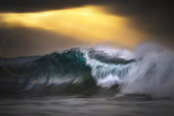 Powerful breaking wave with explosive spray at sunrise at Bronte Beach, Sydney, captured as fine art ocean photography.