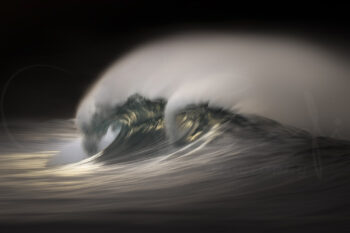 Breaking ocean waves with flowing sea spray at sunrise at Bronte Beach, Sydney, fine art seascape photography.