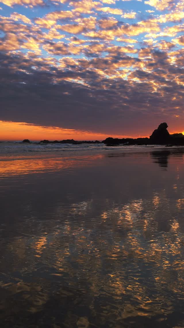 Walking on a dream, with the ocean reflecting every step. 💛