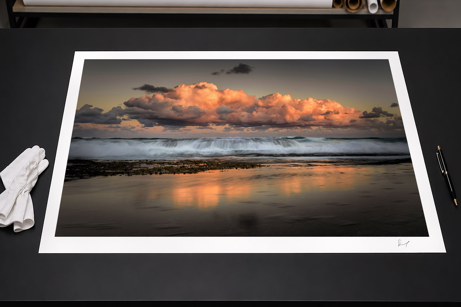 Fine art print of glowing sunset clouds, ocean waves and reflections at Tamarama Beach, Sydney, Australia.