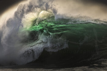 Powerful emerald ocean wave breaking at sunrise on the South Coast of New South Wales, fine art ocean photography.