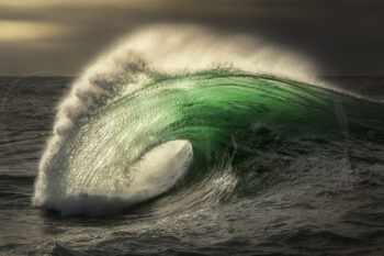 Emerald barrel wave breaking at sunrise on the South Coast of New South Wales, fine art ocean photography.