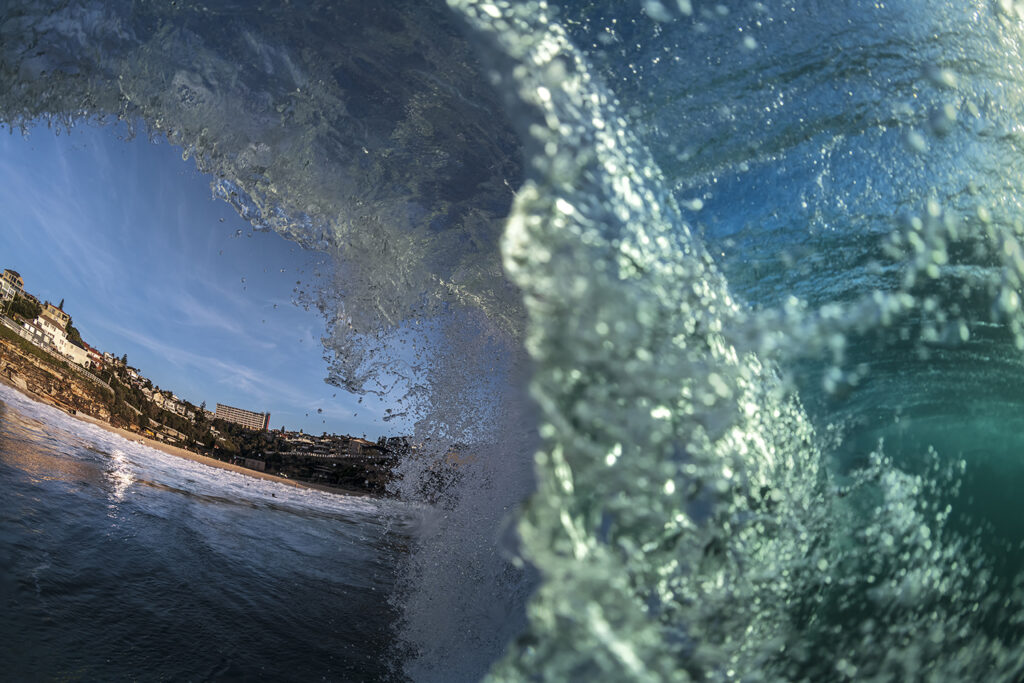 Wave curls, framing coastline at Tamarama Beach – "Barreleyes" Fine Art Ocean Photography Print