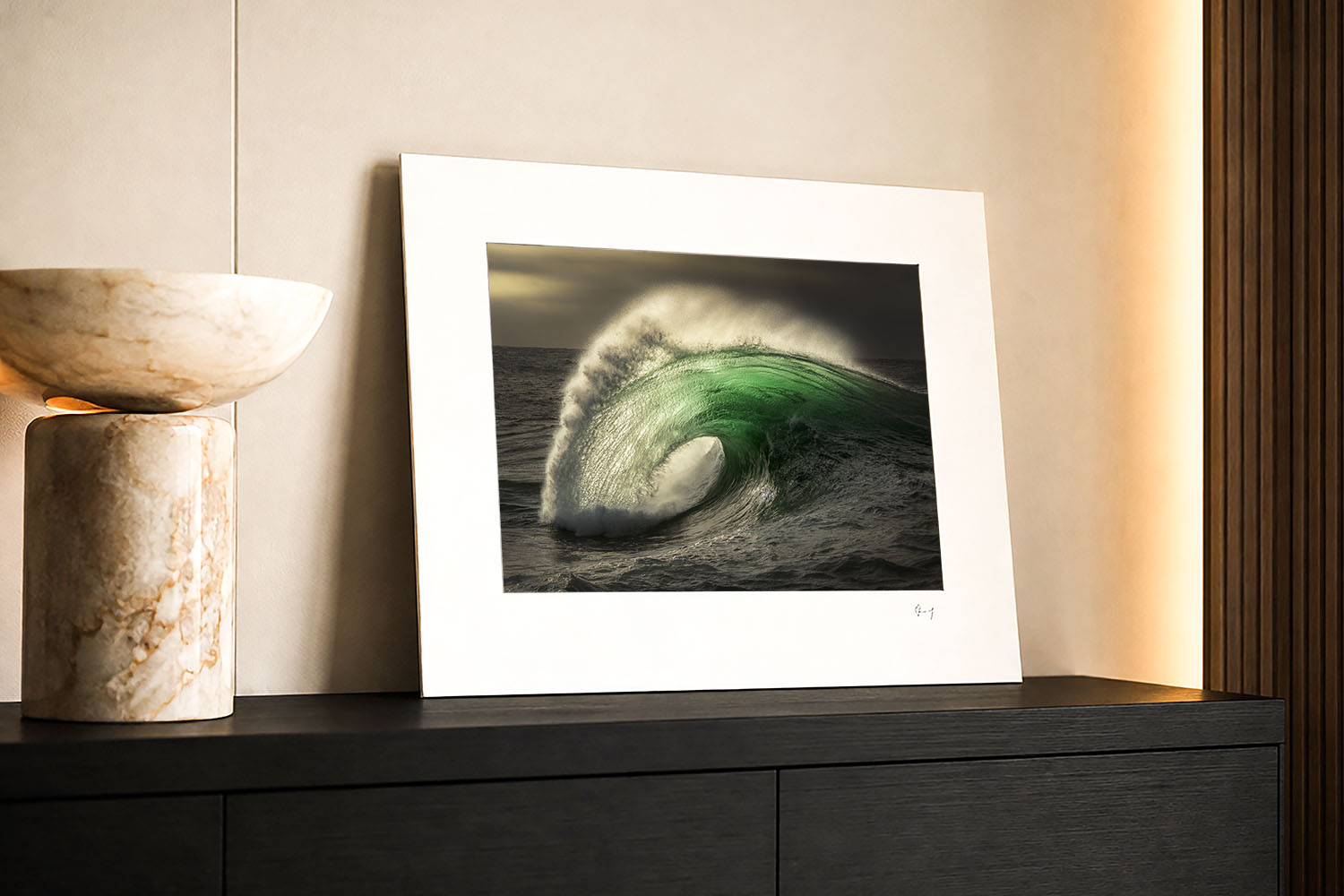 Mounted fine art print of a powerful emerald sunrise wave in southern NSW, displayed as coastal wall art in a modern interior.