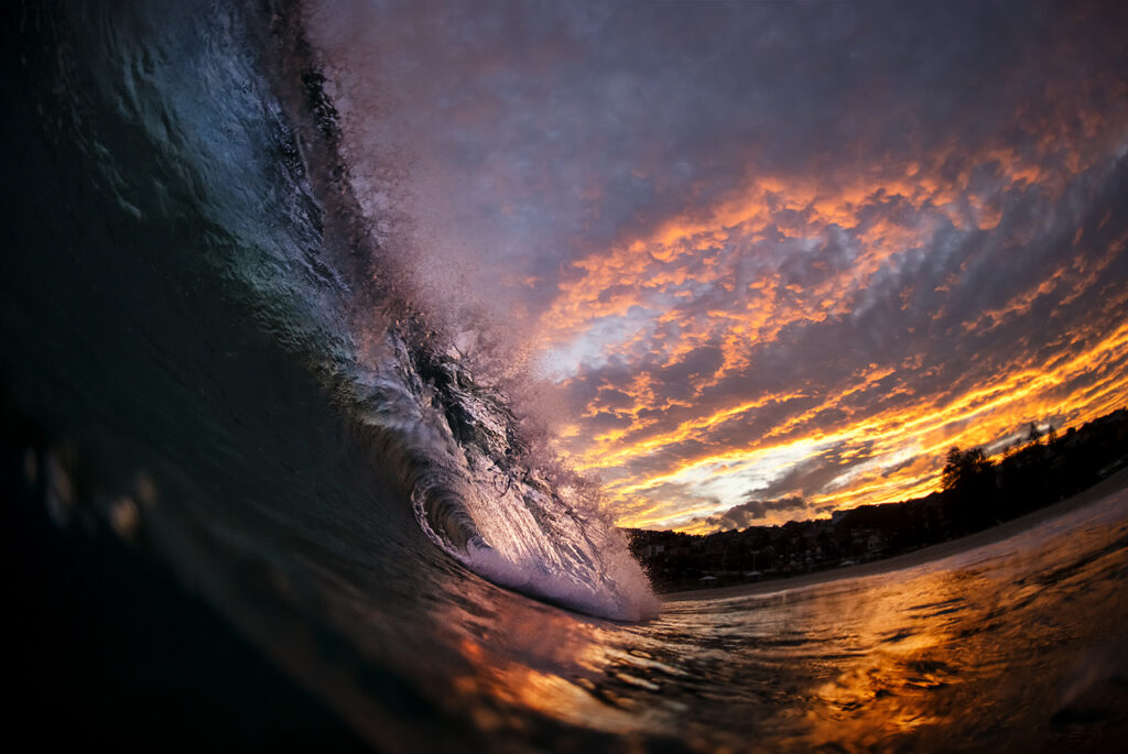 Gold Fever – Fiery sunset surf session at Bronte Beach in Sydney, featuring glowing waves and golden storm light
