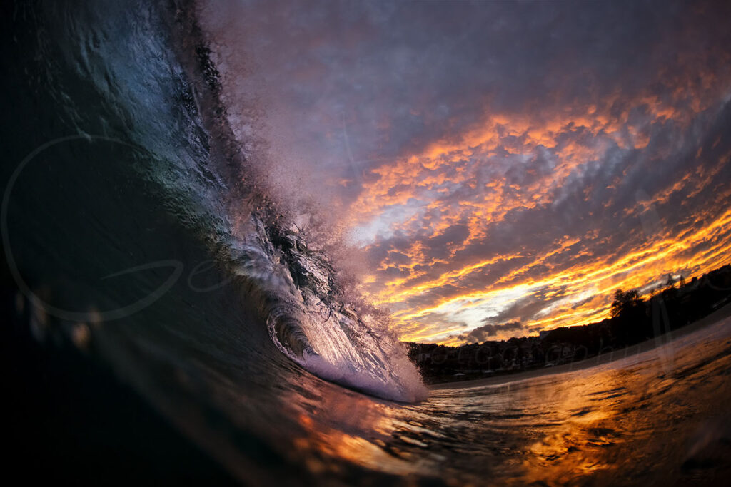 Gold Fever – Fiery sunset surf session at Bronte Beach in Sydney, featuring glowing waves and golden storm light