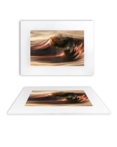 Award-winning fine art ocean print of a wave glowing with fiery sunset hues in Sydney – “Dogoda”