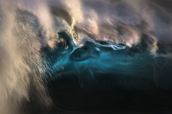 Powerful turquoise wave exploding in golden sunset light in Sydney, limited edition fine art ocean photography print.