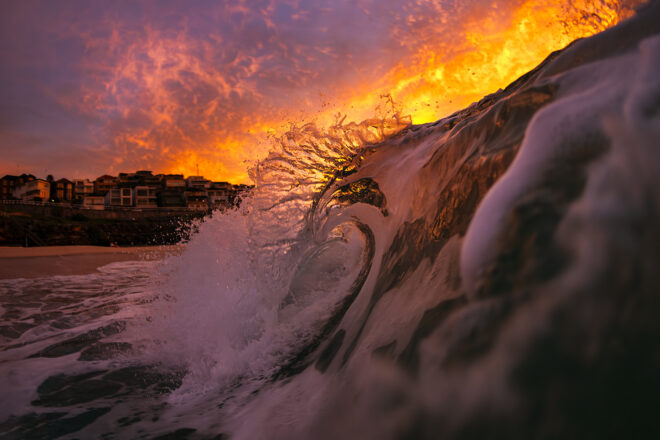 Barrelling wave breaks at sunrise with fiery orange sky at Bronte Beach, Sydney – "Rooster" Fine Art Ocean Photography Print
