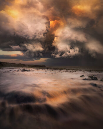 Award-winning fine art ocean print of fiery storm clouds above Tamarama Beach, Sydney – "Storming of the Tartarus"