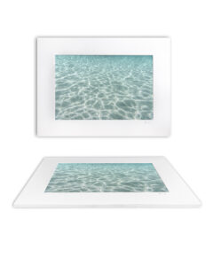 Mounted fine art print of shimmering shallow water at Jervis Bay, Australia, where sunlight dances across the sand in gentle patterns.