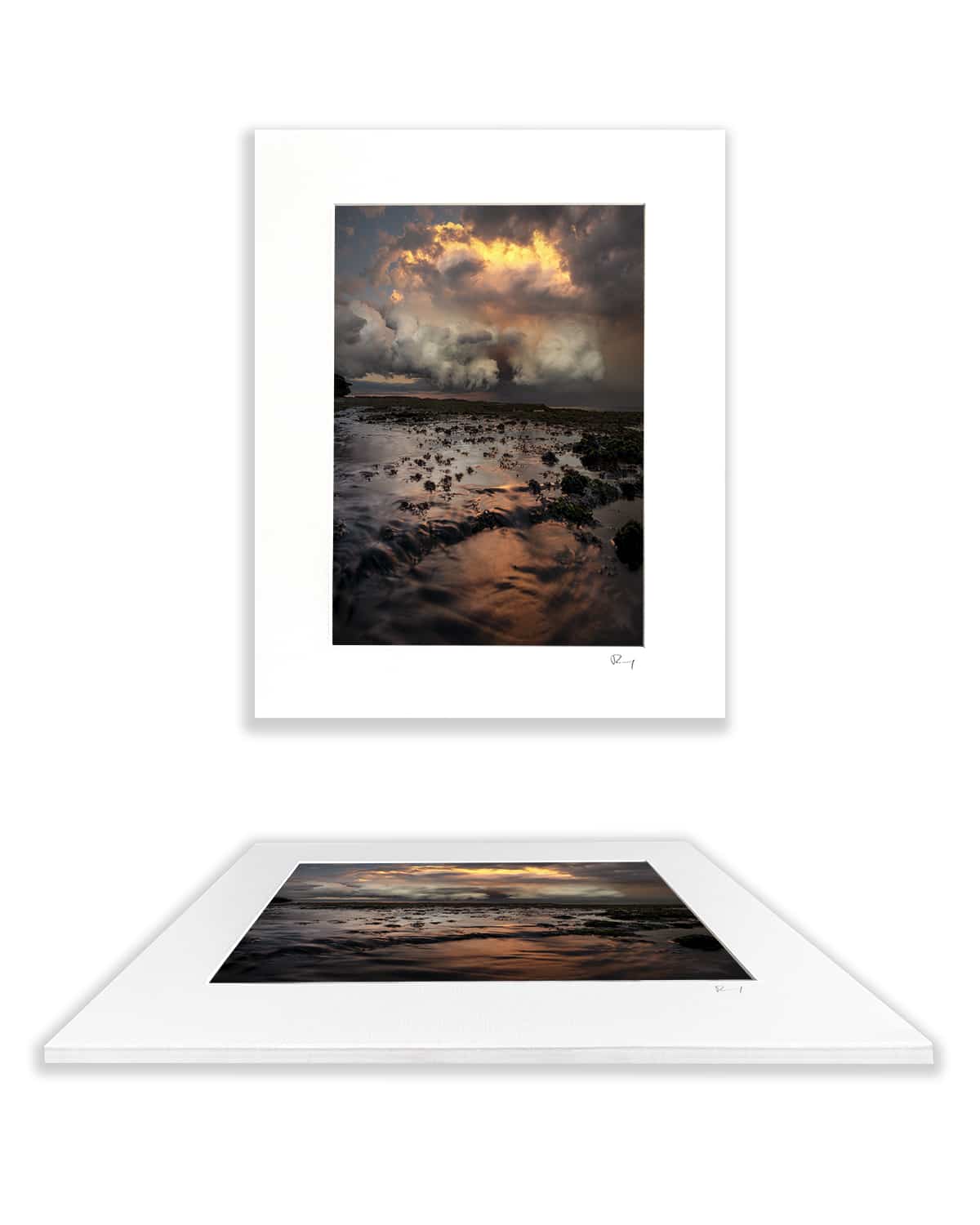 Mounted fine art print of a dramatic storm sunset over Tamarama Beach, Sydney, Australia, presented with a white mat board.